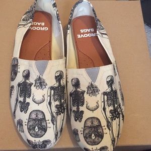 Cream and Black Slip ons. NWOT!